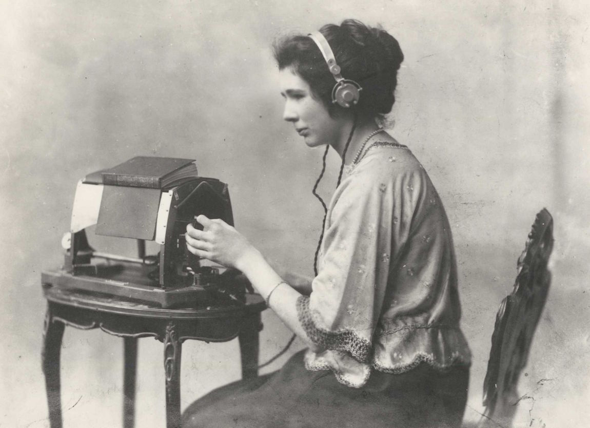 Mary Jameson reading Anthony Trollope’s The Warden on an optophone, ca. 1921, care of Blind Veterans UK.