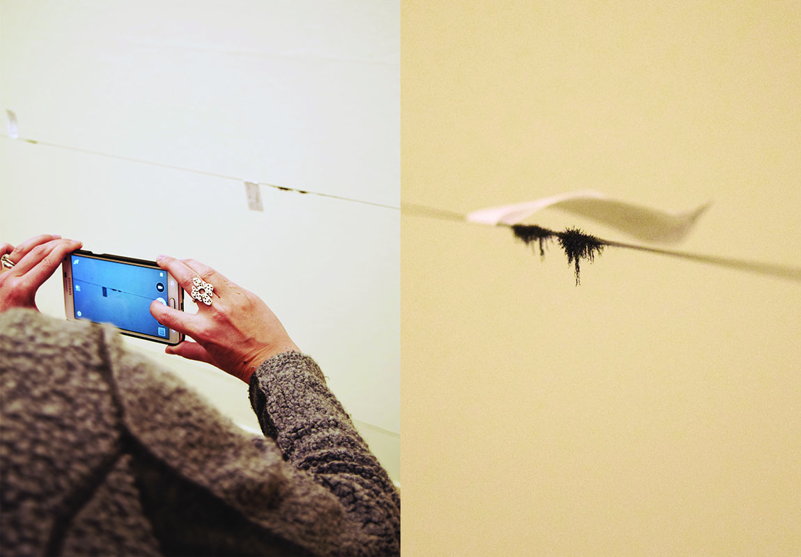 Participant photographing their impression on piano wire (image care of Danielle Morgan)