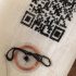 Cross-stitched Twitter QR code in silk on linen.